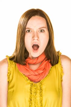 Pretty girl with an afraid expression on white background