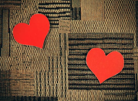 Two Heart Shapes on the Fabric Background