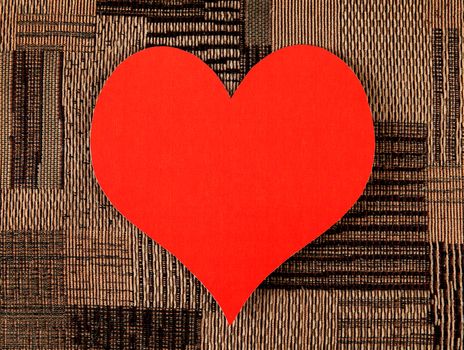 Red Heart Shape on the Fabric Background