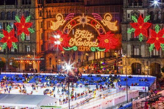 Mexico City Zocalo Christmas Night Celebration Ice Skating Rink,  Feliz Navidad is Spanish for Merry Christmas.