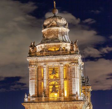 Metropolitan Cathedral Steeple Bells Statues in Zocalo, Center of Mexico City, at Night