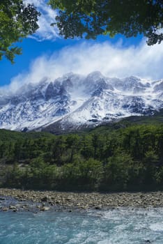 Scenic view of clouds passing over high mountains in Los Glaciares National Park                