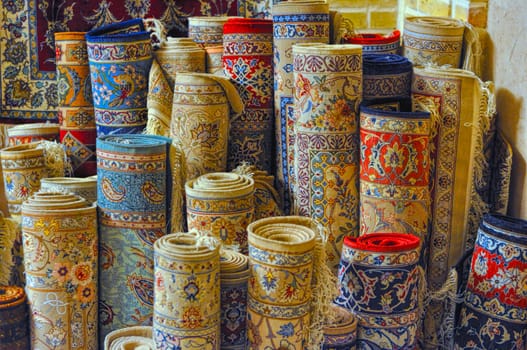 Rolls of persian carpets in Iran