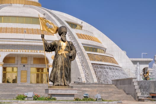 Statues around monument of independence in Ashgabat, capital city of Turkmenistan