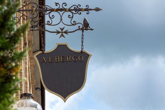 a hotel sign in iron handmade