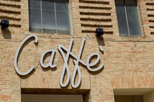 Old commercial sign for bar in Italy