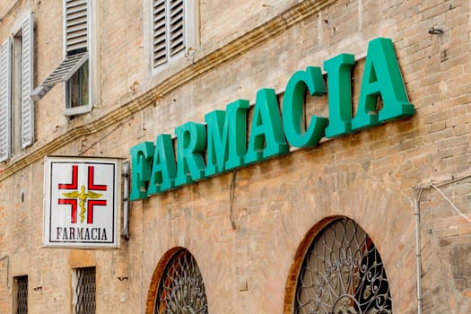 Signboard for old pharmacy in Italy