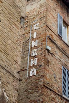 teaches an old cinema in Italy