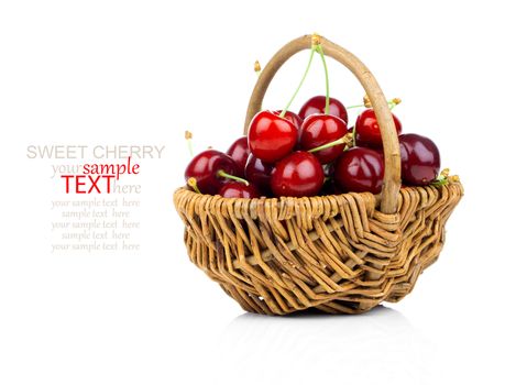 Basket full of fresh red cherry on a white background