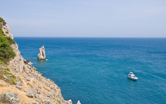 marine bay with rocks in which cutter