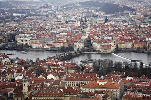 Panorama of Prague divided by the river Vltava and connected by Charles Bridge.