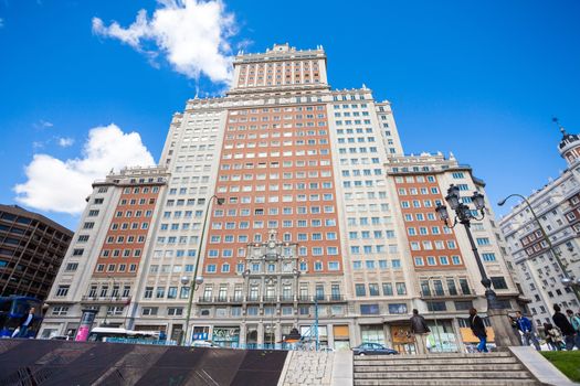 Edificio Espana facade view on a sunny spring day in Madrid, Spain.