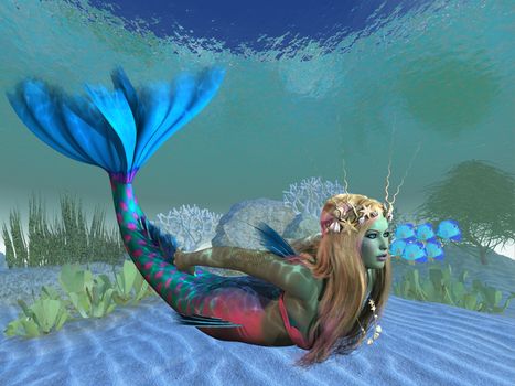 A beautiful multi-colored mermaid swims effortlessly in clear ocean waters.