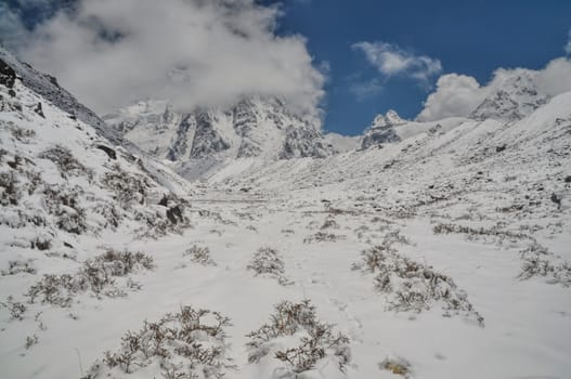 Scenic valley in Himalayas mountains near Kanchenjunga, the third tallest mountain in the world