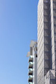 Vertical image of two buildings under construction