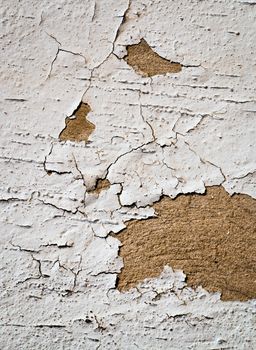 abstract background or texture cracks in white plaster