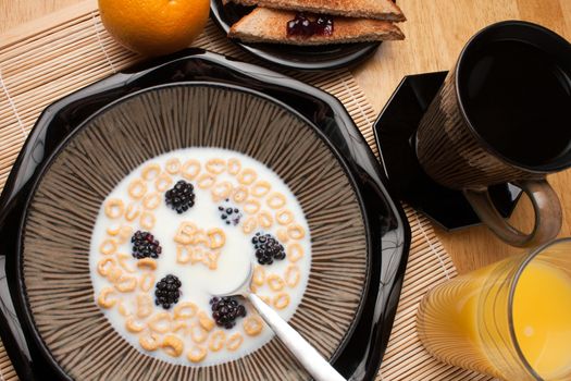 A bowl of alphabet cereal pieces floating in milk with the words BAD DAY spelled out.