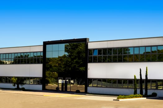 A office building against a blue sky