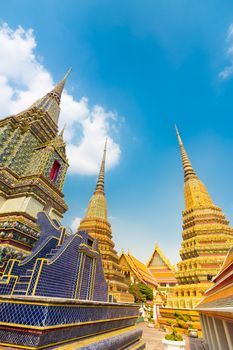 Pagodas of Wat Pho, the Temple of the Reclining Buddha or Wat Phra Chetuphon. Bangkok, Thailand.