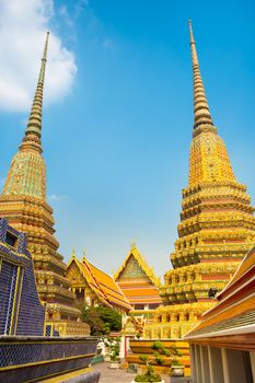 Pagodas of Wat Pho, the Temple of the Reclining Buddha or Wat Phra Chetuphon. Bangkok, Thailand.