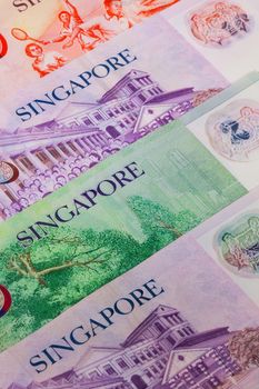 Different banknotes from Singapore on the table