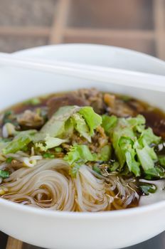 rice noodle soup with pork and vegetables