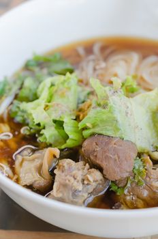 rice noodle soup with pork and vegetables