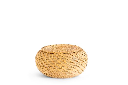 Straw basket closed with content to discover and open