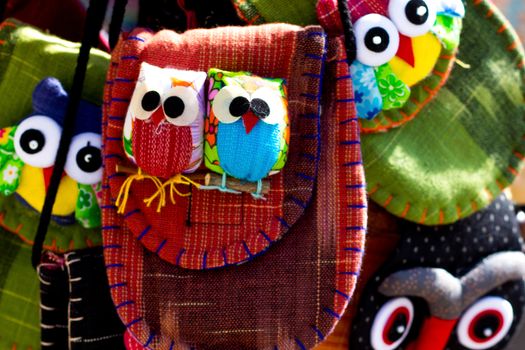 Detail of a stand bag, close-up of owls 