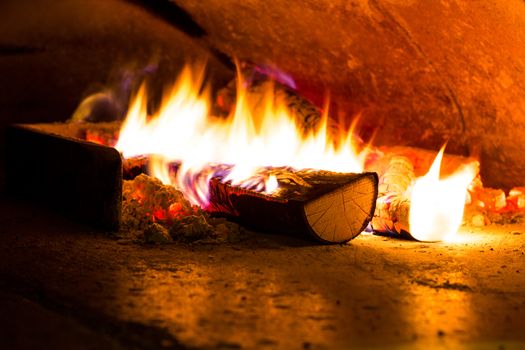 Close-up of flame per make a typical italian food