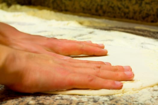 Close-up for preparing a italian pizza