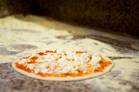 Close-up of making pizza after the cooking