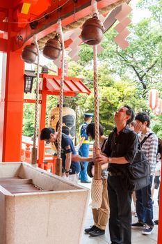 Tokyo,Japan - May 25, 2014 Many people donate money and benediction at temple Tokyo,Japan