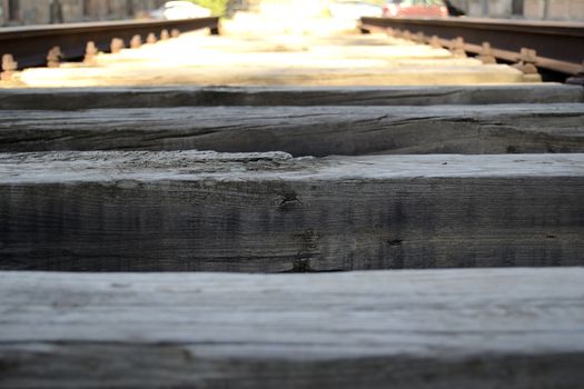oxidized rail, wood and metal