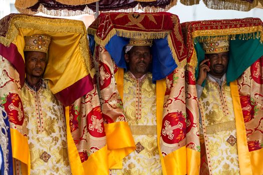 Priests carry the Tabot, a model of the Arc of Covenant, during a colorful procession of Timket celebrations of Epiphany, commemorating the baptism of Jesus, on January 19, 2015 in Addis Ababa.