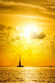 Sailboat and disherman in the sea at sunset, Key west bay, Floride, USA 
