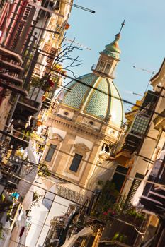 View at the church of San Matteo located in heart of Palermo, Italy, Europe;  tarditional Italian medieval city center with typical narrow residential street.