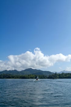 Lake mountain with clouds and blue sky