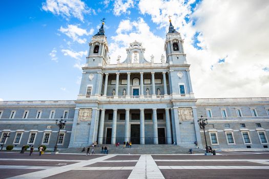 Madrid, Spain - May 6, 2012: Royal palace (Palacio Real de Madrid) with tourists on spring day in Madrid, Spain