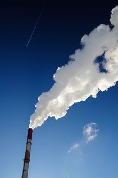 Steam-heat pipe in blue sky background vertical