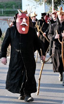 Orani, Sardinia - March 6, 2011: Parade of traditional masks of Sardinia at the Carnival of 6 March 2011 in Orani, Sardinia.