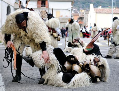 Orani, Sardinia - February 17, 2013: Parade of traditional masks of Sardinia at the Carnival of 17 February 2013 Orani, Sardinia.