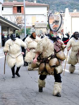 Orani, Sardinia - February 17, 2013: Parade of traditional masks of Sardinia at the Carnival of 17 February 2013 Orani, Sardinia.