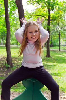 Photo of cute girl with upwards hands