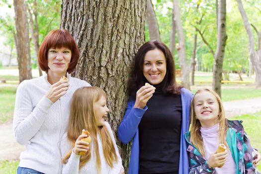 Photo of group laugh people are eating in summer