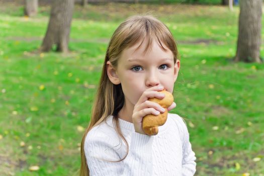 Photo of eating cute girl with long hair