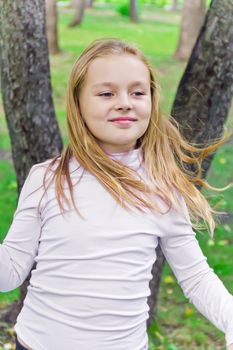 Photo of cute playing girl in summer