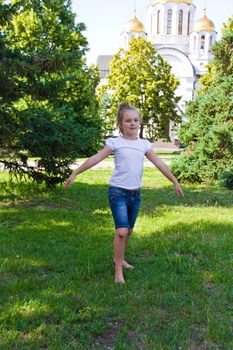 Photo of dancing girl with sore knee in summer