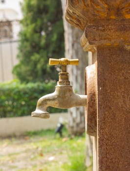 bronze faucet in a national park in Thailand