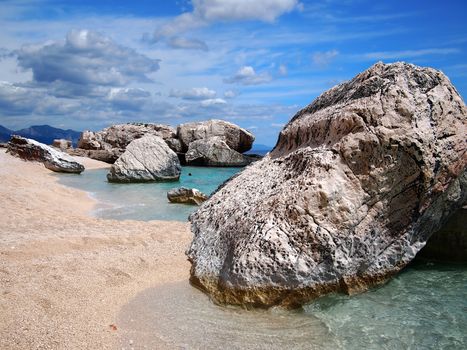 Big rocks at Cala Mariolu, a beach in the Golfo di Orosei, Sardinia, Italy.